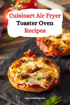 two mini pizzas sitting on top of a cutting board with the words cuisiart air fryer toaster oven recipes