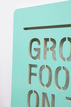 there is a sign that says grow food on it