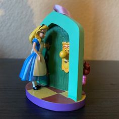 there is a figurine that has been placed in the shape of a house