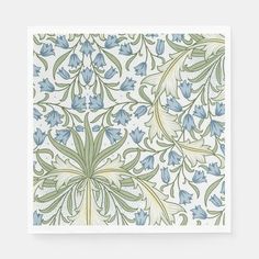 a blue and green floral pattern on white paper