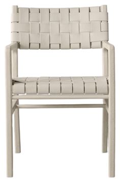 a white chair that is made out of wood and has woven straps on the back