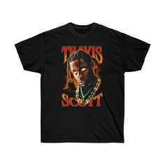 a black t - shirt with travis scott on it