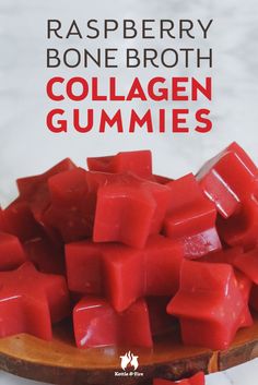 raspberry bone broth collagen gummies on a wooden spoon with text overlay