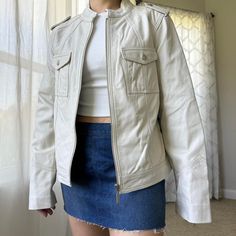 New With Tag, Vintage Moto Jacket In Genuine Lambskin Leather. Color Is A Bone Creme Color. Features: 100% Genuine Lambskin Leather 100% Polyester Lining Button Pockets Main Zipper Closure Era: 00s Brand: Attention Made: China Tag Size: 10 May Fit Multiple Sizes, Xsmall To Large Due To Cut But Please Check Below To Ensure Desired Fit As There’s Only One For Sale. Approximate Measurements, Taken Flat In Inches: Pit To Pit 19.5 Open Hem 19.5 Length 22.5 Shoulder To Shoulder 16 Sleeve 24.25 Conditi Beige Fitted Biker Jacket With Zipper Closure, Fitted Beige Leather Jacket, Casual Style, Fitted Beige Leather Jacket Casual Style, Beige Fitted Leather Jacket, Casual Fitted Biker Jacket, Fitted Cream Outerwear With Snap Buttons, Fitted Beige Leather Jacket With Pockets, Fitted Cream Biker Jacket With Long Sleeves, Hailey Bieber Streetwear