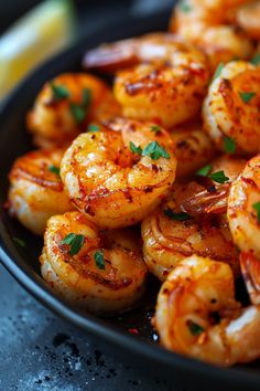 Close-up of seasoned and grilled shrimp garnished with parsley on a plate. Crispy Air Fryer Chicken, Air Fryer Shrimp, Air Fryer Vegetables, Steak Bites Recipe, Best Air Fryer Recipes, Healthy Air Fryer Recipes, The Best Air Fryer, Healthy Air Fryer, Frozen Shrimp