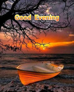 a small boat sitting on top of a beach next to the ocean at sunset with words saying, good evening