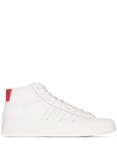 Looking to upgrade your sneaker collection to the next level? Why not lace yourself up into these bright white leather Pro Model high top sneakers from adidas and 424 that are almost too beautifully minimal that you won't want to wear them out the house. Just maybe don't wear them to the club straight away. Featuring a round toe, stitched panels, a lace-up front fastening, punch hole detailing, a signature three stripe detail, branded heel counter and a flat rubber sole. POSITIVELY CONSCIOUS: Ad Adidas Mid-top Sneakers With Vulcanized Sole, White Adidas High-top Platform Sneakers, Adidas High-top Platform Sneakers, Adidas Logo High-top Lace-up Sneakers, Adidas High-top Leather Lace-up Sneakers, Adidas Leather High-top Sneakers With Boost Midsole, Adidas Leather Lace-up High-top Sneakers, Adidas High-top Sneakers With White Sole And Logo, Adidas High-top Lace-up Sneakers With Rubber Sole