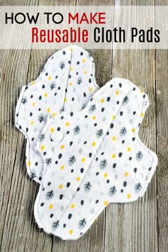 three reusable cloth pads sitting on top of a wooden table with text overlay that says how to make reusable cloth pads