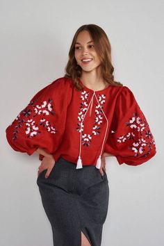 🌷Introducing our Relaxed Fit Puff Sleeve Linen Blouse, the perfect blend of comfort and style for the modern bohemian woman.  This handmade red blouse features charming puff sleeves that add a touch of elegance to any outfit while ensuring a relaxed fit for all-day comfort. The intricate embroidery adds a unique and artistic flair, making this blouse not just a piece of clothing, but a statement of style. Whether you dress it up with skirts or keep it casual with jeans, this Boho Linen Blouse is versatile enough for any occasion--from brunch dates to beach strolls. Embrace sustainable fashion with our artisan-made piece that celebrates individuality and craftsmanship. Care Instructions: Machine wash cold, hang to dry, and iron on low heat to preserve its beautiful shape and embroidery. St Embroidered Cotton Bishop Sleeve Top, Embroidered Bishop Sleeve Cotton Top, Embroidered Cotton Tops With Lantern Sleeves, Red Long Sleeve Blouse With Floral Embroidery, Red Long Sleeve Cotton Embroidered Top, Red Lantern Sleeve Tops For Spring, Red Embroidered Folk Blouse, Red Resham Embroidered Top For Summer, Festive Red Embroidered Cotton Top