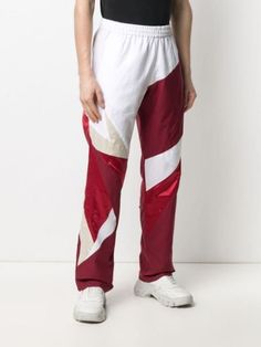 Shop red Reebok colour-block cotton track pants with Express Delivery - Farfetch White Sweatpants With Side Stripes For Streetwear, Red Sporty Sweatpants For The Gym, White Sweatpants With Elastic Side Panels For Streetwear, Sporty Red Sweatpants For Gym, White Color Block Sports Bottoms, White Color Block Bottoms For Sports, White Sportswear Sweatpants With Elastic Panels, Sporty White Sweatpants With Side Stripes, White Sweatpants With Elastic Side Panels