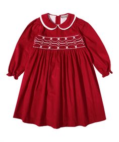 Style #PS-NP86 Made with 100% cotton Cotton Long Sleeve Dress With Smocked Back, Long Sleeve Cotton Smocked Dress With Ruffles, Long Sleeve Smocked Cotton Dress With Ruffles, Fitted Cotton Smocked Dress, Fall Cotton Smock Dress, Fitted Cotton Smocked Dress With Smocked Cuffs, Red Fitted Cotton Smocked Dress, Fitted Red Cotton Smocked Dress, Long Sleeve Cotton Smocked Dress With Smocked Cuffs