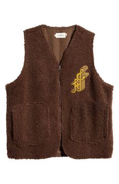 An embroidered logo patch sings on the chest of this retro zip-front vest, teeming with the texture of teddy-like high-pile fleece. 26" length (size Medium) Front zip closure V-neck Front patch pockets Lined 100% polyester Dry clean Imported Black Owned/Founded Honor The Gift, Black Leather Vest, Brown Fits, Favorite Daughter, Mens Black Leather, Maternity Shops, Fleece Vest, Leather Vest, Designer Clothes For Men