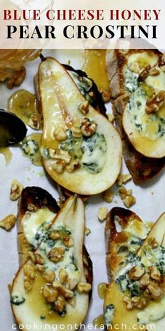 blue cheese honey pear crostini with walnuts and parmesan on top