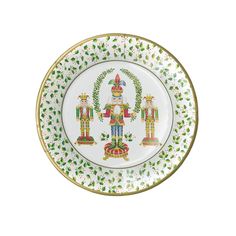 a white and green plate with an image of two nutcrackers on it