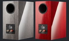 two red and silver speakers side by side on a black background with the number forty