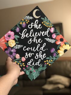 someone is holding up a graduation cap that says she beliveed she could so she did