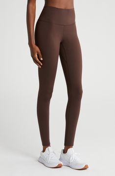 A wide waistband adds to the sublime comfort of leggings that are buttery-soft with light compression to provide support for every move you make. 24" inseam; 9" front rise; 12" back rise (size medium) Pull-on style 75% polyester, 25% elastane Machine wash, dry flat Imported High Waist Brown Workout Leggings, Casual Brown Full-length Leggings, Compressive Beige Leggings For Yoga, Beige Compressive Leggings For Yoga, Cheetah Costume, Sporty Brown Full-length Leggings, Brown Leggings, Ski Gear, Wide Waistband