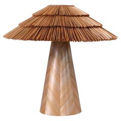 a table lamp made out of bamboo sticks