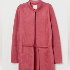 This H&M Pink Faux Suede Coat Is Gorgeous! Nwot, Still Has Plastic Loop Holding The Belt To The Coat Size 2 Color Is Called Raspberry Red. It Was A Limited Edition Item & No Longer In Stores. Stock Photos Are The True Color. For Some Reason, My Camera Makes It Look Red, But It Is Not, It's Pink. Straight-Cut Coat In Soft Faux Suede With No Fasteners Small Stand-Up Collar, Removable Tie Belt At Waist, And Patch Front Pockets Unlined 90% Polyester, 10% Elastane Ptp 19" Length 33" Elegant H&m Fall Outerwear, Elegant H&m Outerwear For Fall, H&m Pink Spring Outerwear, Pink H&m Outerwear For Spring, Pink H&m Outerwear For Fall, H&m Pink Outerwear For Spring, H&m Pink Outerwear For Fall, Fitted Spring Outerwear By H&m, Fitted H&m Outerwear For Fall