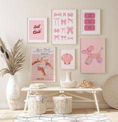 a white table topped with pictures and vases