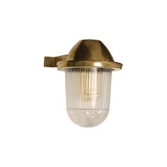 an old fashioned brass outdoor light on a white background