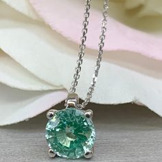 Wow picks! Paraiba tourmaline necklace, Green paraiba pendant, Round paraiba pendant, Ladies 14k gold necklace, Layering jewelry, Birthday gift, #6662 at $299.0 Choose your wows. 🐕 #RoundStone #GreenParaiba #DaintyNecklace #ParaibaTourmaline #14kGoldNecklace #LayeringJewelry #SolidGoldNecklace #NeonParaiba #BirthdayGift #LadiesNecklace Green Brilliant Cut Necklace For May Birthstone, Green Emerald Necklace With Brilliant Cut For May Birthstone, Green Gemstone Round Cut Necklace, Green Gemstone Necklace With Round Cut, Green Fine Jewelry Necklace With Prong Setting, Green Brilliant Cut Necklace For Gift, Green Round Stone Necklace For Formal Occasions, Formal Green Necklace With Round Stone, Green Round Cut Necklace For Anniversary