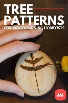 the cover of tree patterns for wood - burning hobbits, with two hands holding a piece of wood