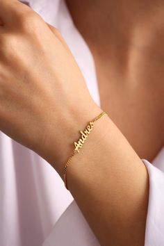 Elevate your style with our Personalized Name Bracelet. Crafted with precision and care, this bracelet features your chosen name elegantly engraved or spelled out in stunning detail. Whether it's a cherished keepsake or a thoughtful gift, this bracelet adds a personal touch to any ensemble. With its adjustable design and durable materials, it's perfect for everyday wear and special occasions alike. Make a statement and showcase your unique identity with this beautiful accessory. * Material: High Bracelet Thick, Custom Kids, Baby Bracelet, Bracelet Dainty, Bridal Gold Jewellery Designs, Text Box, Name Bracelet, Bridal Gold Jewellery, Gold Jewellery Design