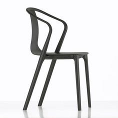 a black plastic chair with an extended back and seat, viewed from the front angle