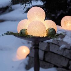 some lights that are sitting in the snow