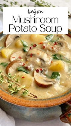 a bowl filled with mushroom potato soup on top of a table