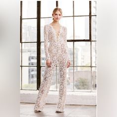 Tadashi Shoji Revel Long-Sleeve Lace Jumpsuit Size 14. I Used Once For My Wedding. I Am 5'6 And Length Was Perfect With Heals. There Is A Small Amount Of Wear At The Bottom, But Pretty Unnoticeable. Comes With Original Bag. Fitted White V-neck Jumpsuits And Rompers, Elegant Sheer Fitted Jumpsuits And Rompers, Elegant Fitted Sheer Jumpsuit, Elegant Fitted Sheer Jumpsuits And Rompers, Elegant White Long Sleeve Jumpsuit, Chic Long Sleeve Jumpsuit For Wedding, Chic Long Sleeve Jumpsuits And Rompers For Wedding, White Long Sleeve Jumpsuits For Evening, White Long Sleeve Jumpsuits And Rompers For Evening