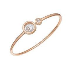 Happy Spirit fascinates by the repetition of the concentric circle motif centred around the dancing diamond, at the origin of the rippling pattern in the water. From the smallest to the largest, the rings nestle perfectly inside each other. Little Diamonds Do Great Things Reference: 858230-9001 METAL: 18k white and rose gold DANCING DIAMONDS: Yes WHITE DIAMOND CARAT: 0.18 GEM-SETTING: with gems Rose Gold Polished Diamond Bracelet, Rose Gold Diamond Bracelet With Polished Finish, Rose Gold Diamond Bracelet Round, Things Reference, Gem Setting, Dancing Diamond, Rose Gold White, House Gifts, Fine Watches