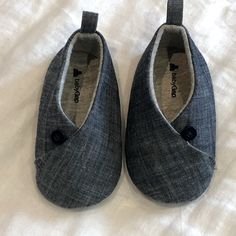 Size 6-12 Months Casual Blue Booties For Playtime, Casual Slip-on Booties For Playtime, Casual Blue Booties With Soft Sole, Casual Non-slip Slip-on Booties, Casual Spring Booties For Playtime, Casual Spring Booties For Outdoor Play, Casual Round Toe Booties For Playtime, Casual Closed Toe Booties With Soft Sole, Denim Baby