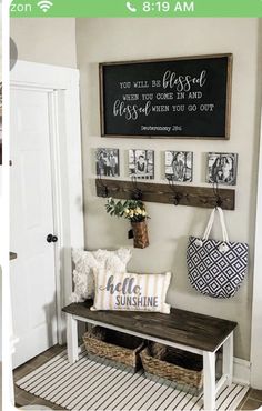 a bench with some pictures hanging on the wall