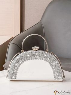 BirdinBag - Elegant Rhinestone-Embellished Ladies Evening Bag, Perfect for Parties Crystal Clutch Bag With Rhinestones, Silver Embellished Crystal Bag, Silver Embellished Crystal Bags, Crystal Clutch With Rhinestones, Silver Crystal Embellished Bags, Silver Top Handle Bag For Wedding, Elegant White Bag With Rhinestones, Silver Handheld Bag With Bling, Silver Embellished Top Handle Evening Bag