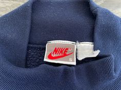 Size S/M. This 90's mock neck Nike sweater is in Excellent pre-owned condition! Check out more vintage Nike gear in my shop https://www.etsy.com/shop/sweetVTGtshirt?section_id=11916484&ref=shopsection_leftnav_4 Label: Nike Gray Tag. USA Made Measurements: Inches Chest (pit to pit): 22 Bottom Hem: 13 Shoulders: 22 Sleeve: 20 Total length: 22 Size: Tag reads Small. See measurements for most accurate sizing info. Please note that pieces are measured while laying flat. Please double where approp Vintage Sweatshirt With Ribbed Collar For Streetwear, Blue Style Fashion, Nike Baby Blue Sweatshirt, Cheap Vintage Blue Sweatshirt, Blue Vintage Nike Sweatshirt, Vintage Blue Crew Neck Sweater, Vintage Blue Cotton Sweatshirt, Beavis And Butthead Shirt, 90s Blue Crew Neck Sweatshirt