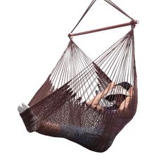 a woman is laying in a hammock