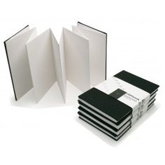 several black and white folders stacked on top of each other with one opened in the middle