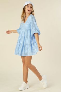 Get ready to have some fun in this Gingham Checked Mini Tiered Dress! With its bright and playful design, this mini dress is sure to liven up any occasion. The dress is lined for comfort and features a tiered design for a playful touch. Perfect for those who don't take themselves too seriously. 50% polyester 50% rayon Lined Hand wash cold, dry flat Runs small, size up Model is 5' 7" and wearing size Small Tiered Dress Pattern, Little Black Dress Outfit, Strapless Sundress, Farm Clothes, Classic White Shirt, Black Dress Outfits, No See, Crop Top Shirts, Jumpsuit Shorts Rompers