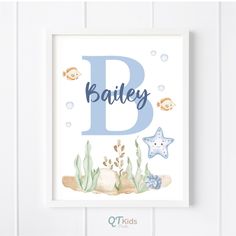 a watercolor painting with the letter b and sea animals on it's sides