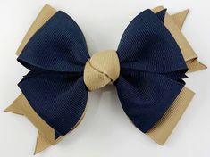 "4.5\" hair bow in a double layer pinwheel bow style. Back to school colors of navy blue and khaki. Custom colors available! Dark green version shown for size reference. CLIP OPTIONS Regular clip option: Non-slip 1.75\" single prong alligator clip partially lined with matching ribbon for baby / toddlers / little girls / fine hair Large clip option: 3\" long partially lined alligator clip with teeth and non slip: for big girls / thick or curly hair (Knot may be wrapped around clip for better hold Back To School Uniform, Navy Blue Uniform, School Bows, School Hair Bows, Pinwheel Bow, Bow Style, Hair Knot, Navy And Khaki, Back To School Hairstyles