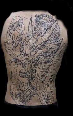 the back of a man with tattoos on his body and dragon tattoo designs on his back