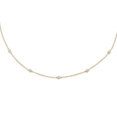 This beautiful, simple necklace, often referred to as a style called Diamonds by the Yard, features diamonds set into bezels along the necklace chain. Its shorter length sits just above the collar bone, begging to be seen. 14k yellow gold Five 2mm diamonds 15 inch length Please allow 4-6 weeks for production, as this piece is made to order just for you Luxury Minimalist Single Strand Diamond Necklace, Single Line Diamond Necklace, Luxury Minimalist Diamond Necklace With Delicate Chain, Refined Diamond Necklace With Accents, 3mm Diamond 17inch Linear Diamond Necklace, Collar Bone, Simple Necklace, Vintage Collection, Bones