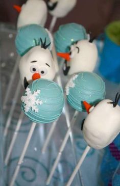 frosted marshmallows with snowmen on them