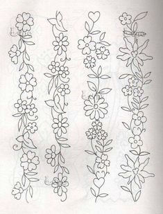 some flowers and leaves are drawn on paper