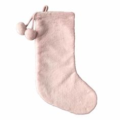 a pink stocking with pom - poms hanging from it's side