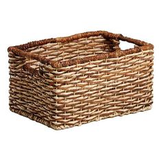 a brown wicker basket on a white background