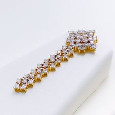 This exquisite 18k gold set, weighing a total of 26.0 grams, features a timeless design adorned with dazzling diamonds. The yellow gold finish enhances its luxurious appeal, making it perfect for any special occasion. The set includes a necklace with a total diamond weight of 8.20 carats, featuring F-G color and VS quality diamonds in round brilliant cut shapes. The necklace has a length of 15.75 inches with a 0.7-inch drop length, adjustable 1-inch links, and a secure lobster lock. The matching Timeless Gold Diamond Earrings With Diamond Accents, Hand-set Diamond Earrings, Fine Jewelry, Hand Set Diamond Earrings Fine Jewelry, Timeless Gold Diamond Earrings With Pave Setting, Elegant Diamond-shaped Diamond Earrings, Formal Yellow Gold Diamond Necklace, Timeless Gold Diamond-cut Earrings, Timeless Gold Diamond Cut Earrings, Exquisite Hand Set Diamond Earrings