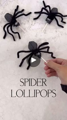 the spider lollipops are made out of black paper